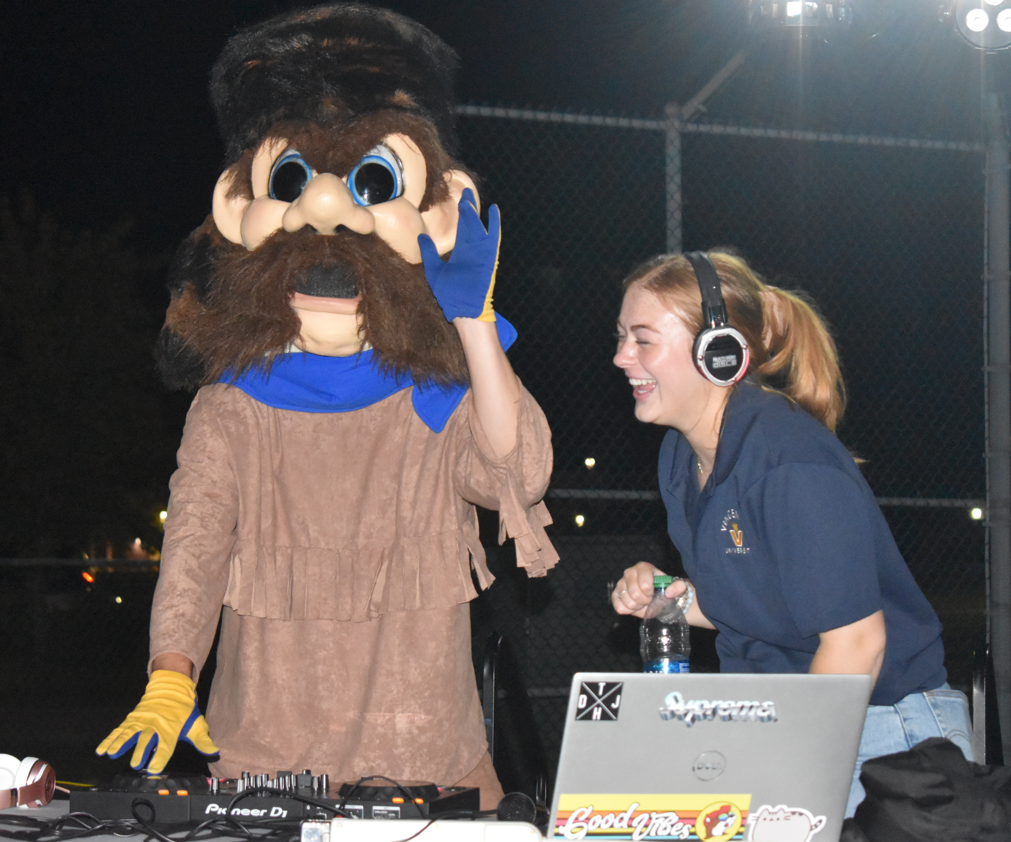 Shelby Liegl and VU mascot Trailblazer Willie DJ at the Silent Headphone Disco during Welcome Week in the fall